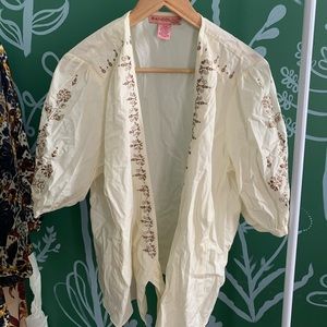 Embroidered wrap blouse